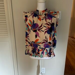 Silk like Floral pull over shirt with elastic waist and ruffle peplum!!!